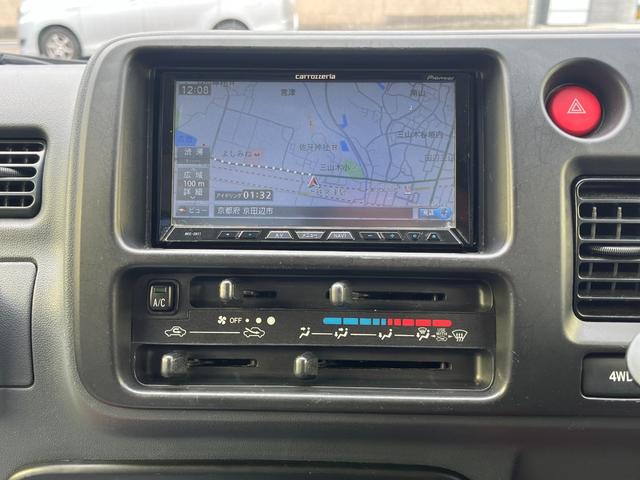 エアコン・パワステスペシャルVS ワンオーナー 禁煙車 4WD 5MT 三方開 カロッツェリアHDDナビ フルセグTV bluetoothオーディオ 荷台大型作業灯 純正荷台マット 社外LEDヘッドライト ヘッドライトレベライザー(13枚目)