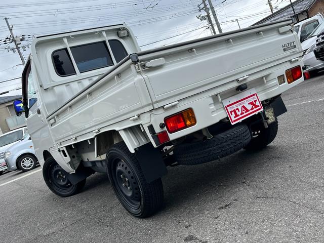 エアコン・パワステスペシャルVS ワンオーナー 禁煙車 4WD 5MT 三方開 カロッツェリアHDDナビ フルセグTV bluetoothオーディオ 荷台大型作業灯 純正荷台マット 社外LEDヘッドライト ヘッドライトレベライザー(34枚目)