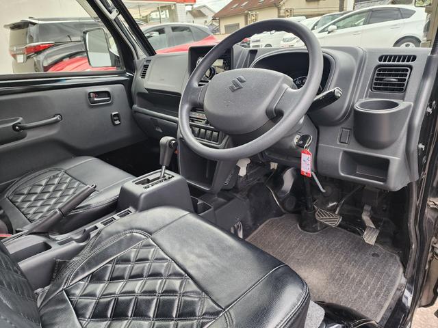 スーパーキャリイ Ｘ　禁煙車　５ＡＧＳ　ＨＩＤ　フォグ　キーレス　ＥＴＣ　セーフティサポート　革調シートカバー　社外１５ＡＷ　社外ＣＤオーディオ　オーバーヘッドシェルフ　パワーウィンドゥ　エアコン　パワステ　作業灯　三方開（25枚目）