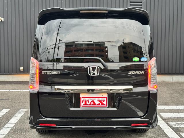 ステップワゴンスパーダ Ｚ　クールスピリット　禁煙車　８人乗　両側パワスラ　純正ＨＤＤナビ　フルセグＴＶ　バックカメラ　ＥＴＣ　パドルシフト　クルコン　ハーフレザー　シートリフター　後席サンシェード　ＨＩＤヘッドライト　スマートキー　純正１７ＡＷ（63枚目）