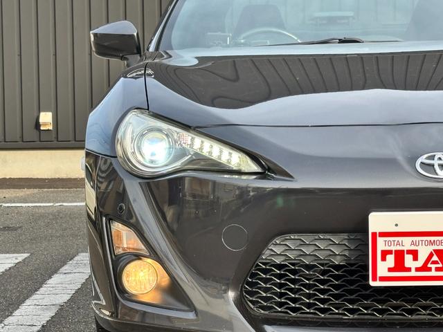 86 GT 禁煙車 6MT TRDドアスタビ 前後ソナー 純正SDナビ フルセグTV BT音楽 HIDヘッド Frフォグ オートライト トランクスポイラー Sキー 革巻H アルミペダル 電格ミラー 純正17AW(34枚目)