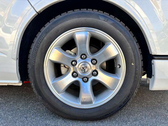 ハイエースバン スーパーGL ダークプライムII 1オーナー 禁煙 両パワ(サイドガラス小窓付換装) LSD 玄武リーフ・ブロック KYBショック UIビークルフェンダー・リヤスタビ・室内レール ESSEXエアロ 強化ドライブシャフト ヒッチメンバー(56枚目)