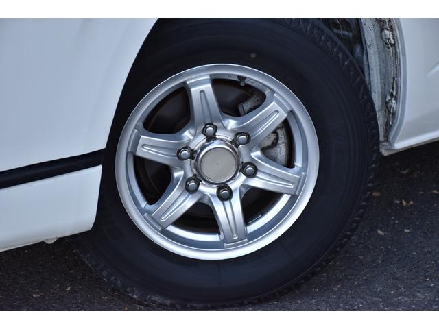ハイエースバン ロングスーパーGL 純正ナビ/CD/DVD/Bluetooth接続/リアヒーター/シートカバー/純正LEDヘッド/両側スライドドア/バッドフェイス/スモークテールランプ/キーレスエントリー/フロントLEDエアロ/電格ミラ(9枚目)