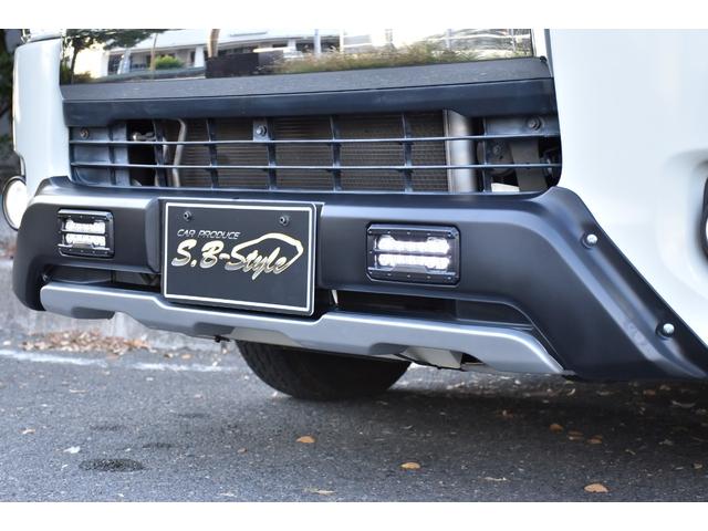 ハイエースバン ロングスーパーGL 純正ナビ/CD/DVD/Bluetooth接続/リアヒーター/シートカバー/純正LEDヘッド/両側スライドドア/バッドフェイス/スモークテールランプ/キーレスエントリー/フロントLEDエアロ/電格ミラ(43枚目)