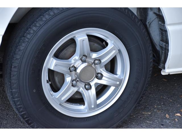 ハイエースバン ロングスーパーGL 純正ナビ/CD/DVD/Bluetooth接続/リアヒーター/シートカバー/純正LEDヘッド/両側スライドドア/バッドフェイス/スモークテールランプ/キーレスエントリー/フロントLEDエアロ/電格ミラ(67枚目)