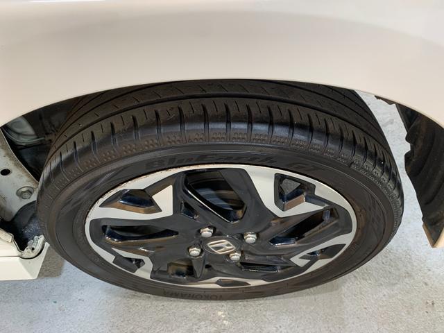 N-BOXカスタム G・Lターボホンダセンシング ETC ホンダセンシング クルーズコントロール ハーフレザーシート パドルシフト ステアリングスイッチ オートライト シーケンシャルパターンランプ  USB充電ソケット LEDヘッドライト(50枚目)