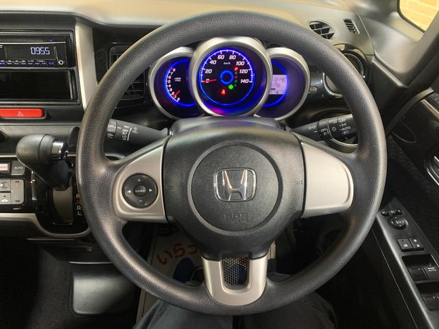 N-BOXカスタム G・Lパッケージ プッシュスタートエンジン クラリオンCDオーディオ ETC 左側パワースライドドア 純正HIDヘッドライト ステアリングスイッチ オートライト フロントフォグランプ マット・バイザー(7枚目)