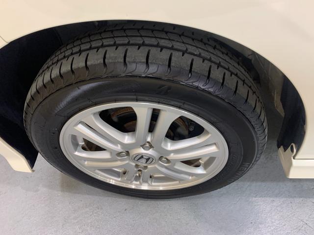 N-BOXカスタム G・Lパッケージ プッシュスタートエンジン クラリオンCDオーディオ ETC 左側パワースライドドア 純正HIDヘッドライト ステアリングスイッチ オートライト フロントフォグランプ マット・バイザー(43枚目)