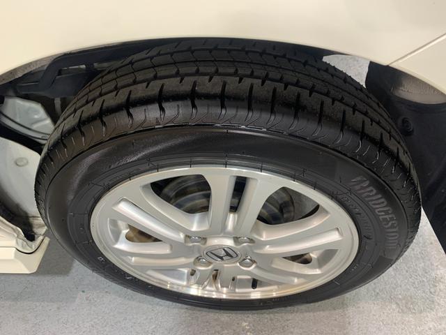 N-BOXカスタム G・Lパッケージ プッシュスタートエンジン クラリオンCDオーディオ ETC 左側パワースライドドア 純正HIDヘッドライト ステアリングスイッチ オートライト フロントフォグランプ マット・バイザー(44枚目)