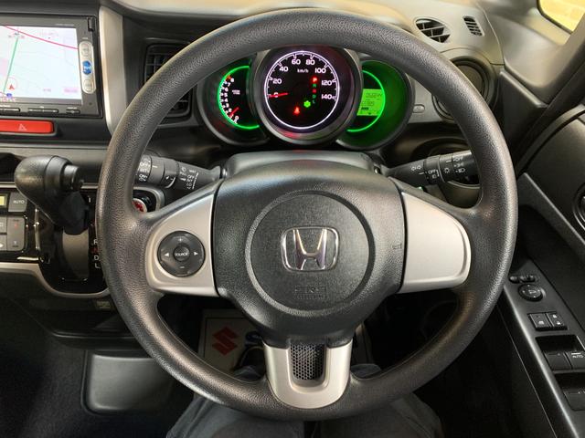 N-BOX G SSパッケージ 純正SDナビ ワンセグテレビ バックカメラ 左側パワースライドドア ハロゲンヘッドライト ステアリングスイッチ オートライト フロントフォグランプ ヘッドライトレベライザー 電動格納式ドアミラー(10枚目)