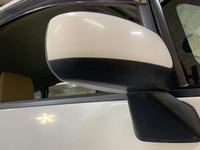 ムーヴ Ｌ　社外ＤＶＤナビ　ハロゲンヘッドライト　ヘッドライトレベライザー　電格ドアミラー　フロントアームレスト　シートアンダーＢＯＸ　キーレスマットバイザー　純正１４インチスチールホイール（33枚目）