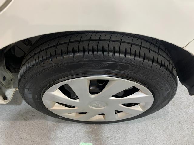 ムーヴ Ｌ　社外ＤＶＤナビ　ハロゲンヘッドライト　ヘッドライトレベライザー　電格ドアミラー　フロントアームレスト　シートアンダーＢＯＸ　キーレスマットバイザー　純正１４インチスチールホイール（46枚目）