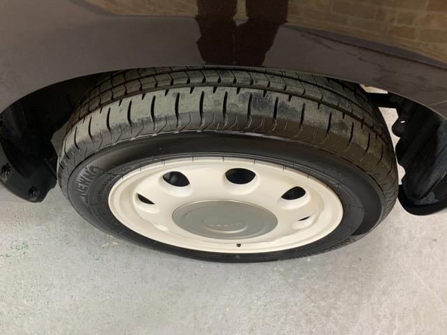 アルトラパンショコラ Ｇ　純正ＳＤナビ　ワンセグ　電格ドアミラー　プッシュスタートエンジン　オートライト　ＨＩＤヘッドライト　オリジナルシートカバー　純正１４インチアルミホイール　チルトステアリング　盗難防止システム（48枚目）