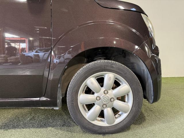 ＭＲワゴン １０ｔｈアニバーサリー　リミテッド　保証付き　修復歴無　Ｂカメラ　ＨＩＤオートライト　Ｐスタート　タッチパネルオーディオ　ＵＳＢ　ＣＤ　ステアリングスイッチ　スマートキー　純正１４インチＡＷ　ウィンカーミラー　ベンチシート　フルフラット（21枚目）