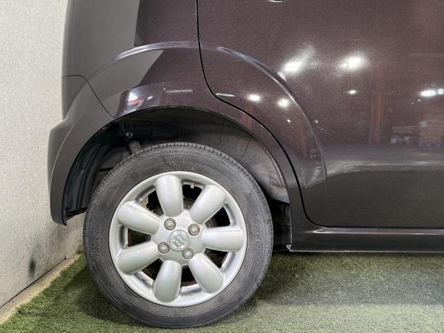 ＭＲワゴン １０ｔｈアニバーサリー　リミテッド　保証付き　修復歴無　Ｂカメラ　ＨＩＤオートライト　Ｐスタート　タッチパネルオーディオ　ＵＳＢ　ＣＤ　ステアリングスイッチ　スマートキー　純正１４インチＡＷ　ウィンカーミラー　ベンチシート　フルフラット（23枚目）