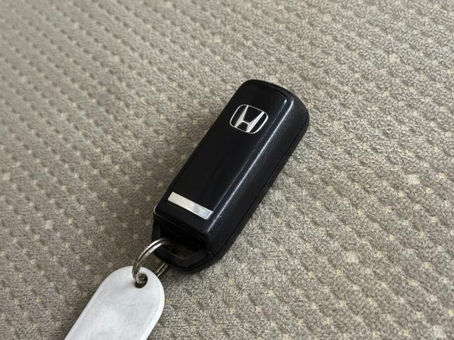 N-BOX G・Lパッケージ 保証付き 修復歴無 ETC PSD フルセグナビTV DVD CD ESC Pスタート アイドリングストップ ステリモ オートエアコン スマートキー 社外14インチAW 電動格納ミラー レベライザー(79枚目)