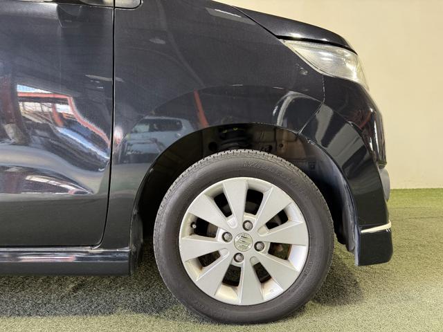 ワゴンＲスティングレー Ｔ　保証付　修復歴無　ターボ　ＥＴＣ　Ｂカメラ　フルセグナビ　ＤＶＤ　ＣＤ　ＨＩＤオートライト　フォグ　Ｐスタート　パドルシフト　スマートキー　純正１４インチＡＷ　ウィンカー付電動格納ミラー　フルフラット（23枚目）