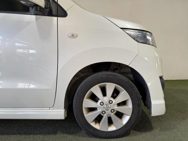 ワゴンＲスティングレー Ｘ　保証付　修復歴無　Ｐスタート　純正１４インチＡＷ　ＨＩＤヘッドライト　フォグランプ　オートエアコン　スマートキー　電動格納ミラー　純正オーディオ　ＣＤ　ベンチシート　フルフラット　ＡＢＳ　Ｗエアバッグ（21枚目）