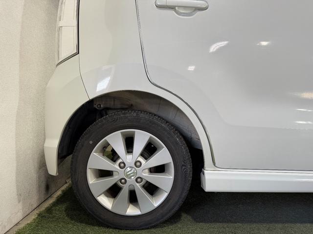 ワゴンＲスティングレー Ｘ　保証付　修復歴無　Ｐスタート　純正１４インチＡＷ　ＨＩＤヘッドライト　フォグランプ　オートエアコン　スマートキー　電動格納ミラー　純正オーディオ　ＣＤ　ベンチシート　フルフラット　ＡＢＳ　Ｗエアバッグ（23枚目）