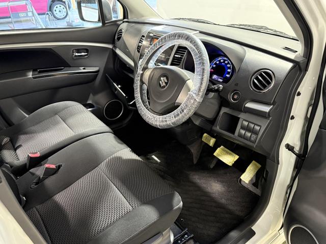 ワゴンＲスティングレー Ｘ　保証付　修復歴無　Ｐスタート　純正１４インチＡＷ　ＨＩＤヘッドライト　フォグランプ　オートエアコン　スマートキー　電動格納ミラー　純正オーディオ　ＣＤ　ベンチシート　フルフラット　ＡＢＳ　Ｗエアバッグ（29枚目）