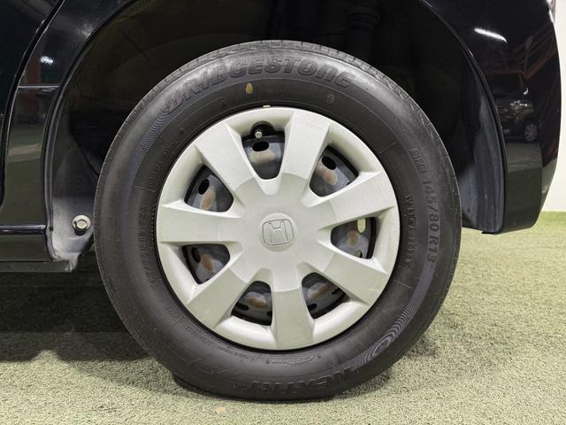 N-BOX G 保証付き 修復歴無 ETC フルセグナビTV DVD CD 横滑り防止 Pスタート アイドリングストップ スマートキー 電格ミラー レベライザー ベンチシート 両側スライド ナビ装着用スペシャルPKG(44枚目)