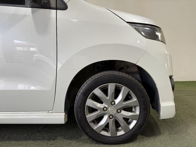 ワゴンＲスティングレー リミテッド　保証付　修復歴無　Ｂカメラ　Ｐスタート　ＨＩＤオートライト　フォグ　ハーフレザーシート　スマートキースペアキー付　純正１４インチＡＷ　ウィンカー付電格ミラー　ベンチシート　フルフラット　シートリフター（22枚目）