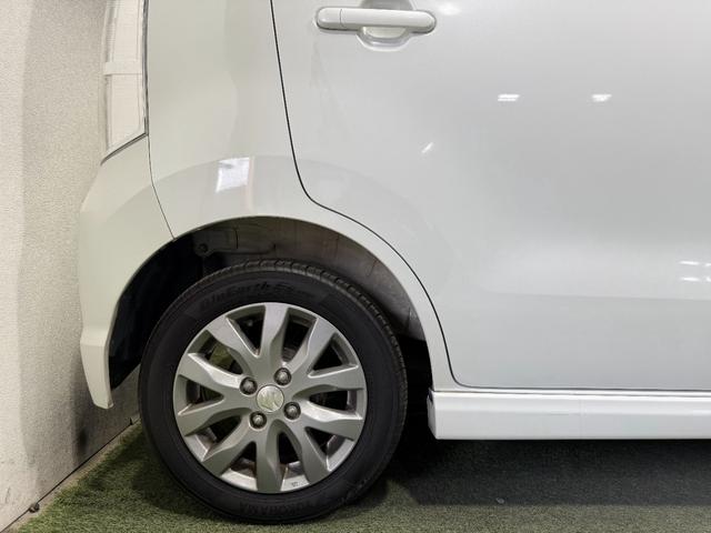 ワゴンＲスティングレー リミテッド　保証付　修復歴無　Ｂカメラ　Ｐスタート　ＨＩＤオートライト　フォグ　ハーフレザーシート　スマートキースペアキー付　純正１４インチＡＷ　ウィンカー付電格ミラー　ベンチシート　フルフラット　シートリフター（24枚目）