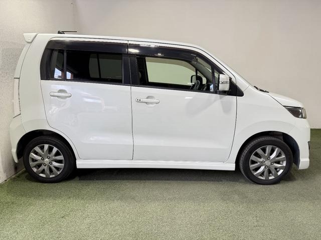 ワゴンＲスティングレー リミテッド　保証付　修復歴無　Ｂカメラ　Ｐスタート　ＨＩＤオートライト　フォグ　ハーフレザーシート　スマートキースペアキー付　純正１４インチＡＷ　ウィンカー付電格ミラー　ベンチシート　フルフラット　シートリフター（26枚目）