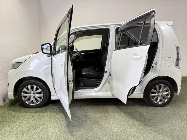 ワゴンＲスティングレー リミテッド　保証付　修復歴無　Ｂカメラ　Ｐスタート　ＨＩＤオートライト　フォグ　ハーフレザーシート　スマートキースペアキー付　純正１４インチＡＷ　ウィンカー付電格ミラー　ベンチシート　フルフラット　シートリフター（50枚目）