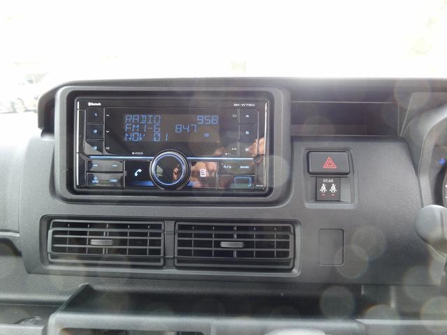ハイゼットカーゴ クルーズ　サポカーＳワイド適合　Ｂカメラ　エアコン　アクセサリーソケット　Ｐスタート　スマートインナーミラー　コーナーセンサー　横滑り防止機能　誤発進抑制機能　電動格納ミラー　パワーウインドウ　キーフリー（11枚目）