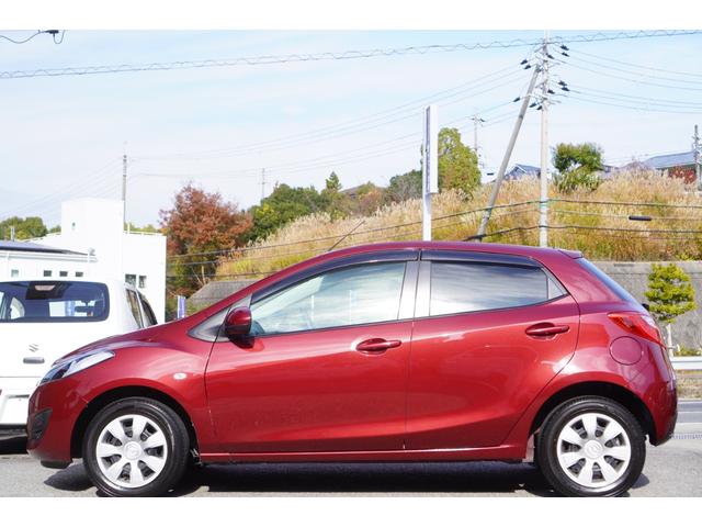 デミオ １３Ｃ　５速ＭＴ／ワンオーナー／バリューパッケージ／ダークテインテッドガラス／キーレスキー／電動格納ミラー／ＣＤオーディオ（ＵＳＢ端子付き）（5枚目）