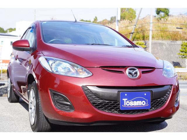 デミオ １３Ｃ　５速ＭＴ／ワンオーナー／バリューパッケージ／ダークテインテッドガラス／キーレスキー／電動格納ミラー／ＣＤオーディオ（ＵＳＢ端子付き）（6枚目）