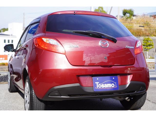 デミオ １３Ｃ　５速ＭＴ／ワンオーナー／バリューパッケージ／ダークテインテッドガラス／キーレスキー／電動格納ミラー／ＣＤオーディオ（ＵＳＢ端子付き）（9枚目）