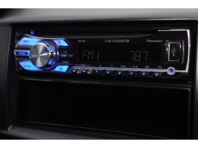 デミオ １３Ｃ　５速ＭＴ／ワンオーナー／バリューパッケージ／ダークテインテッドガラス／キーレスキー／電動格納ミラー／ＣＤオーディオ（ＵＳＢ端子付き）（11枚目）