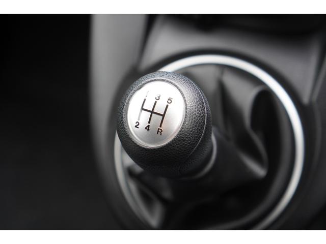 デミオ １３Ｃ　５速ＭＴ／ワンオーナー／バリューパッケージ／ダークテインテッドガラス／キーレスキー／電動格納ミラー／ＣＤオーディオ（ＵＳＢ端子付き）（14枚目）