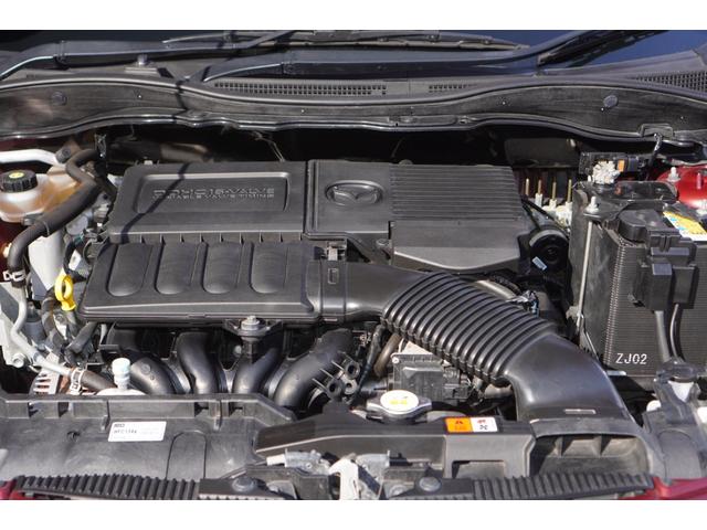 デミオ １３Ｃ　５速ＭＴ／ワンオーナー／バリューパッケージ／ダークテインテッドガラス／キーレスキー／電動格納ミラー／ＣＤオーディオ（ＵＳＢ端子付き）（18枚目）