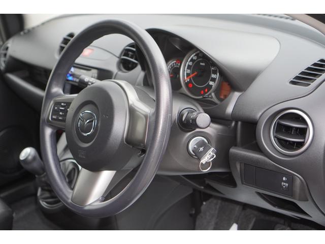 デミオ １３Ｃ　５速ＭＴ／ワンオーナー／バリューパッケージ／ダークテインテッドガラス／キーレスキー／電動格納ミラー／ＣＤオーディオ（ＵＳＢ端子付き）（22枚目）