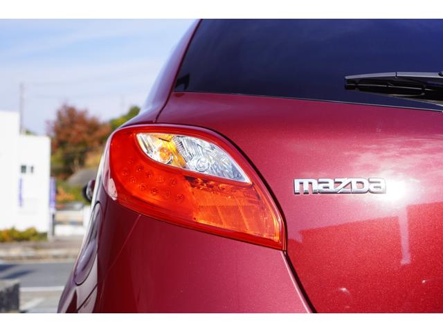 デミオ １３Ｃ　５速ＭＴ／ワンオーナー／バリューパッケージ／ダークテインテッドガラス／キーレスキー／電動格納ミラー／ＣＤオーディオ（ＵＳＢ端子付き）（36枚目）