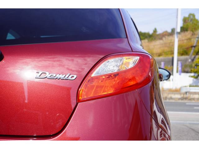 デミオ １３Ｃ　５速ＭＴ／ワンオーナー／バリューパッケージ／ダークテインテッドガラス／キーレスキー／電動格納ミラー／ＣＤオーディオ（ＵＳＢ端子付き）（37枚目）