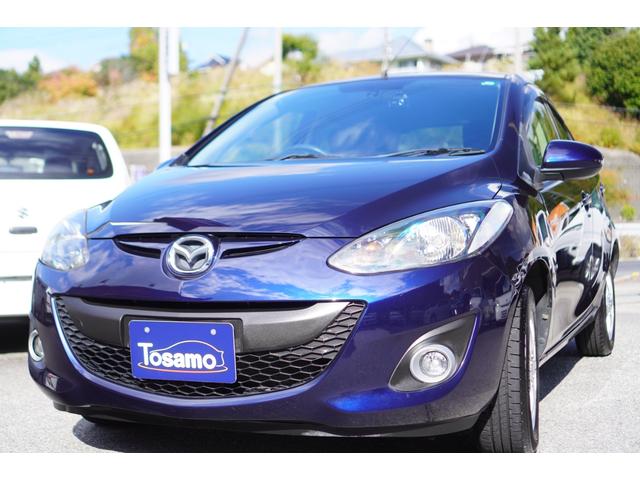 デミオ １５Ｃ　５速ＭＴ／メモリーナビ／地デジ／バックカメラ／オートライト／ドライブレコーダー／ドライブコンフォートパッケージ／社外１４インチアルミホイール／キーレスキー（7枚目）