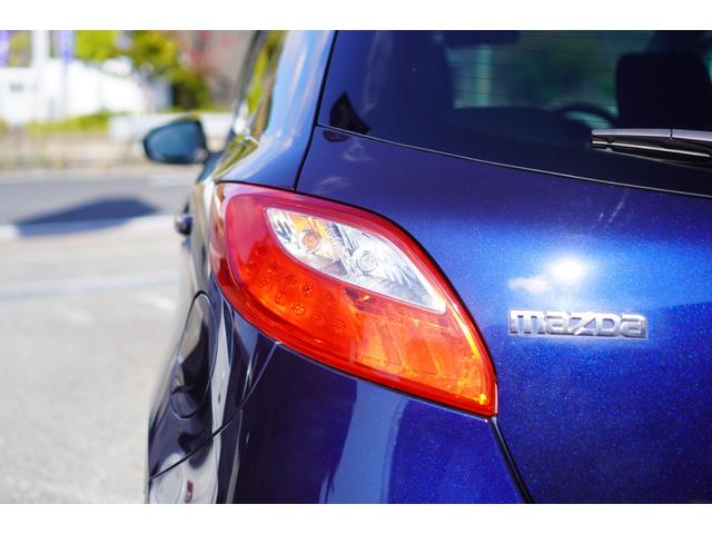 デミオ １５Ｃ　５速ＭＴ／メモリーナビ／地デジ／バックカメラ／オートライト／ドライブレコーダー／ドライブコンフォートパッケージ／社外１４インチアルミホイール／キーレスキー（42枚目）