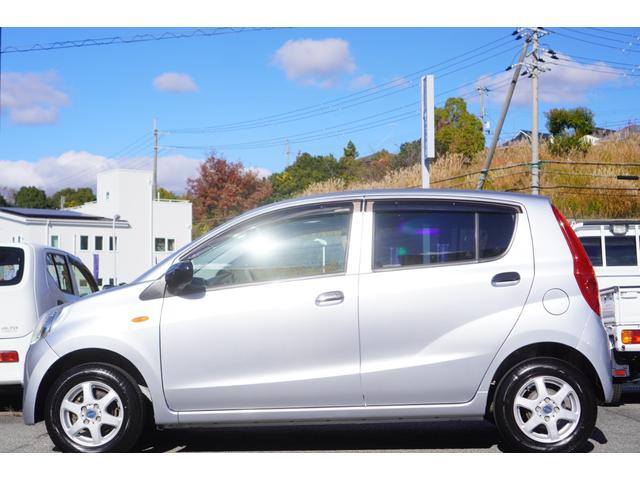 ミラ Ｘスペシャル　５速ＭＴ／車検令和９年１月まで／純正ＣＤオーディオ／収納式ドリンクホルダー／キーレスキー／社外１３インチアルミホイール／エアコン／パワステ／パワーウィンドウ（5枚目）