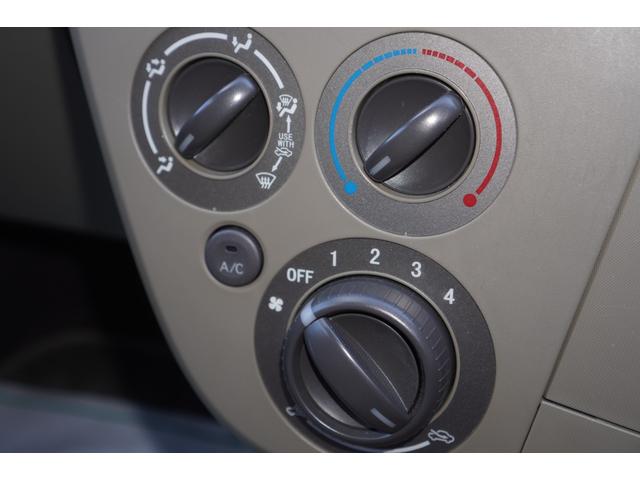 ミラ Ｘスペシャル　５速ＭＴ／車検令和９年１月まで／純正ＣＤオーディオ／収納式ドリンクホルダー／キーレスキー／社外１３インチアルミホイール／エアコン／パワステ／パワーウィンドウ（12枚目）