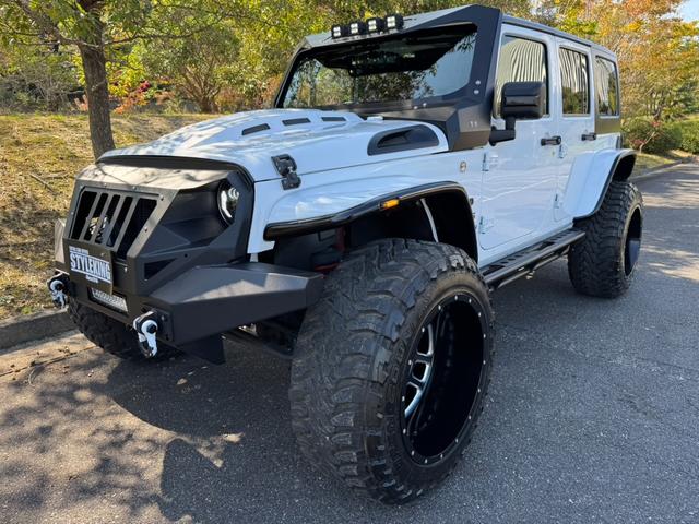 ジープ・ラングラーアンリミテッド スポーツ D車/リフトUP/22インチAW/前後スチールバンパー/スクリーンガード/オーバーフェンダー/スチールサイドステップ/2本出しマフラー/LEDヘッド・テール/社外フード/パナナビ/リクライニングKIT(11枚目)