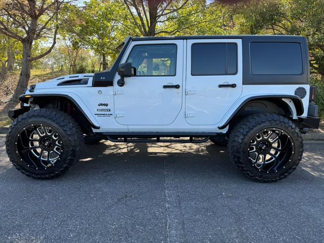 ジープ・ラングラーアンリミテッド スポーツ D車/リフトUP/22インチAW/前後スチールバンパー/スクリーンガード/オーバーフェンダー/スチールサイドステップ/2本出しマフラー/LEDヘッド・テール/社外フード/パナナビ/リクライニングKIT(14枚目)