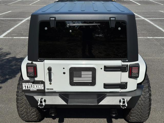 ジープ・ラングラーアンリミテッド スポーツ D車/リフトUP/22インチAW/前後スチールバンパー/スクリーンガード/オーバーフェンダー/スチールサイドステップ/2本出しマフラー/LEDヘッド・テール/社外フード/パナナビ/リクライニングKIT(31枚目)