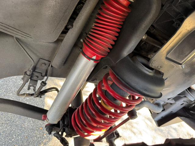 ジープ・ラングラーアンリミテッド スポーツ D車/リフトUP/22インチAW/前後スチールバンパー/スクリーンガード/オーバーフェンダー/スチールサイドステップ/2本出しマフラー/LEDヘッド・テール/社外フード/パナナビ/リクライニングKIT(32枚目)