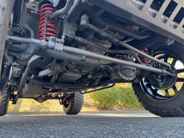 ジープ・ラングラーアンリミテッド スポーツ D車/リフトUP/22インチAW/前後スチールバンパー/スクリーンガード/オーバーフェンダー/スチールサイドステップ/2本出しマフラー/LEDヘッド・テール/社外フード/パナナビ/リクライニングKIT(33枚目)