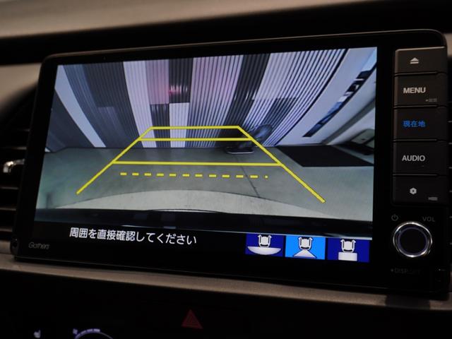 フィット ｅ：ＨＥＶリュクス　ワンオーナー　９型ナビ　衝突軽減ブレーキ　渋滞追従機能　リアカメラ　ＬＥＤオートライト　オートハイビーム　サイド＆カーテンＡＢ　Ｐセンサー　本革シート　ステアリングヒーター　ＥＴＣ２．０　ＵＳＢ（3枚目）