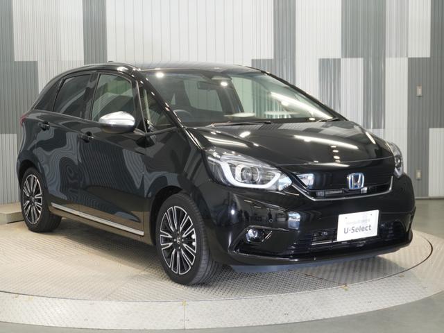 フィット ｅ：ＨＥＶリュクス　ワンオーナー　９型ナビ　衝突軽減ブレーキ　渋滞追従機能　リアカメラ　ＬＥＤオートライト　オートハイビーム　サイド＆カーテンＡＢ　Ｐセンサー　本革シート　ステアリングヒーター　ＥＴＣ２．０　ＵＳＢ（7枚目）